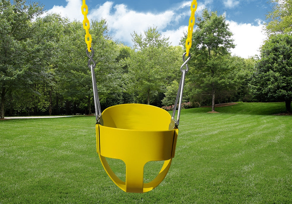 Lifestyle shot of the yellow full bucket toddler swing by Gorilla Playsets from the front.